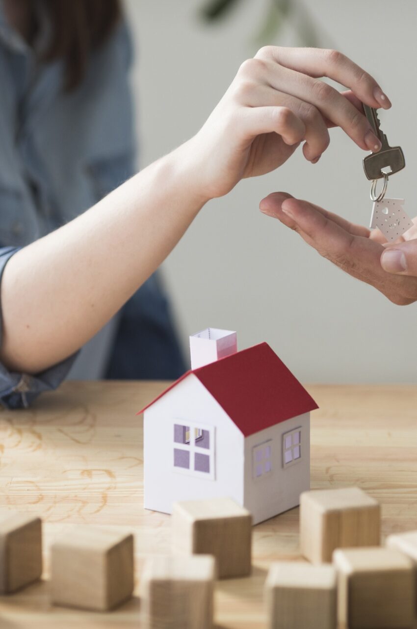 https://havenstoneproperties.co.uk/wp-content/uploads/2025/01/close-up-woman-s-hand-giving-house-key-man-wooden-table-1-850x1280.jpg